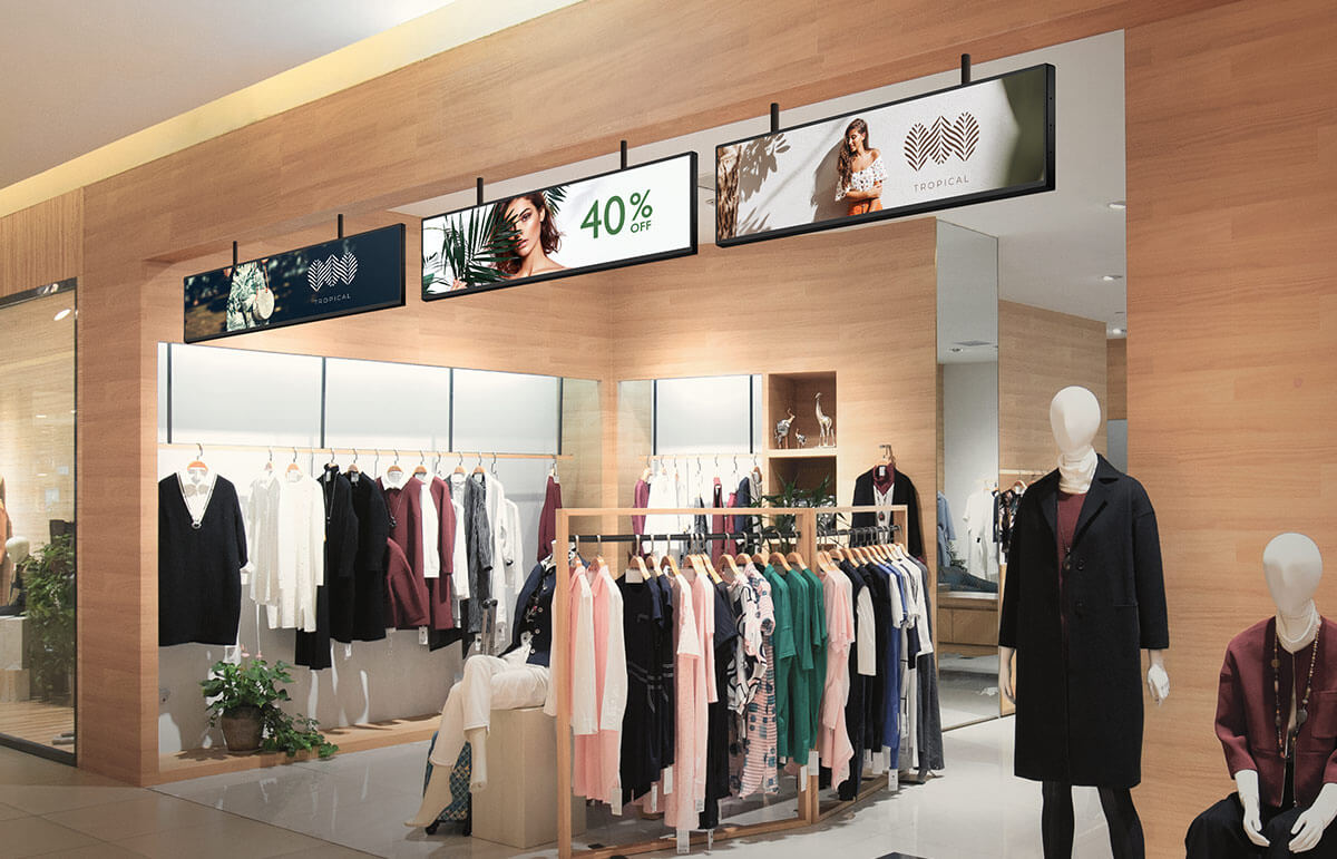 A fashion store uses digital signage.
