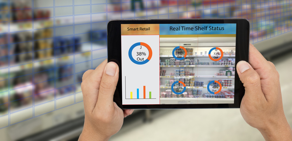 Photo of smart shelving analytics using a tablet in a retail store.